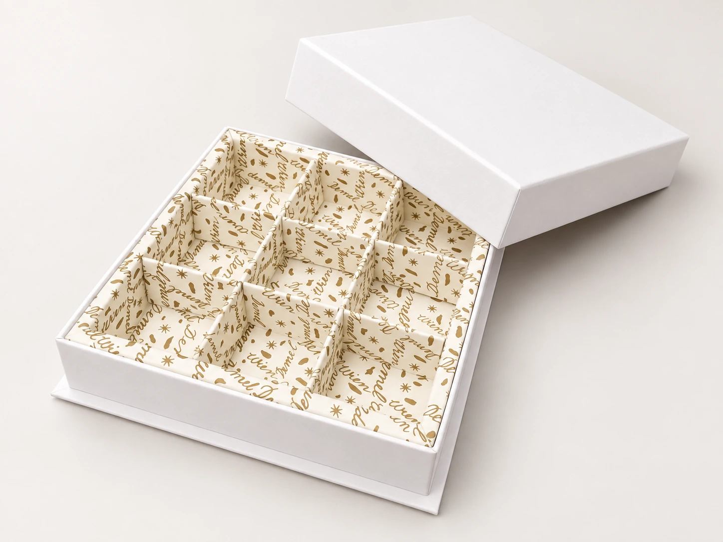 Premium chocolate packaging with multi-compartment paper insert
